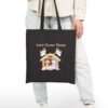 Love Came Down Canvas Tote in Black held by female model