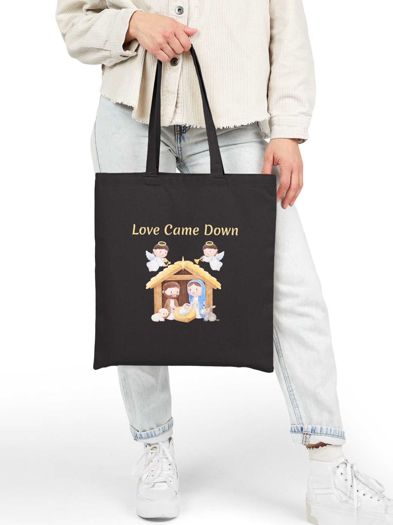 Love Came Down Canvas Tote in Black held by female model