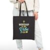Worship Is My Vibe Canvas Tote in Black held by female model