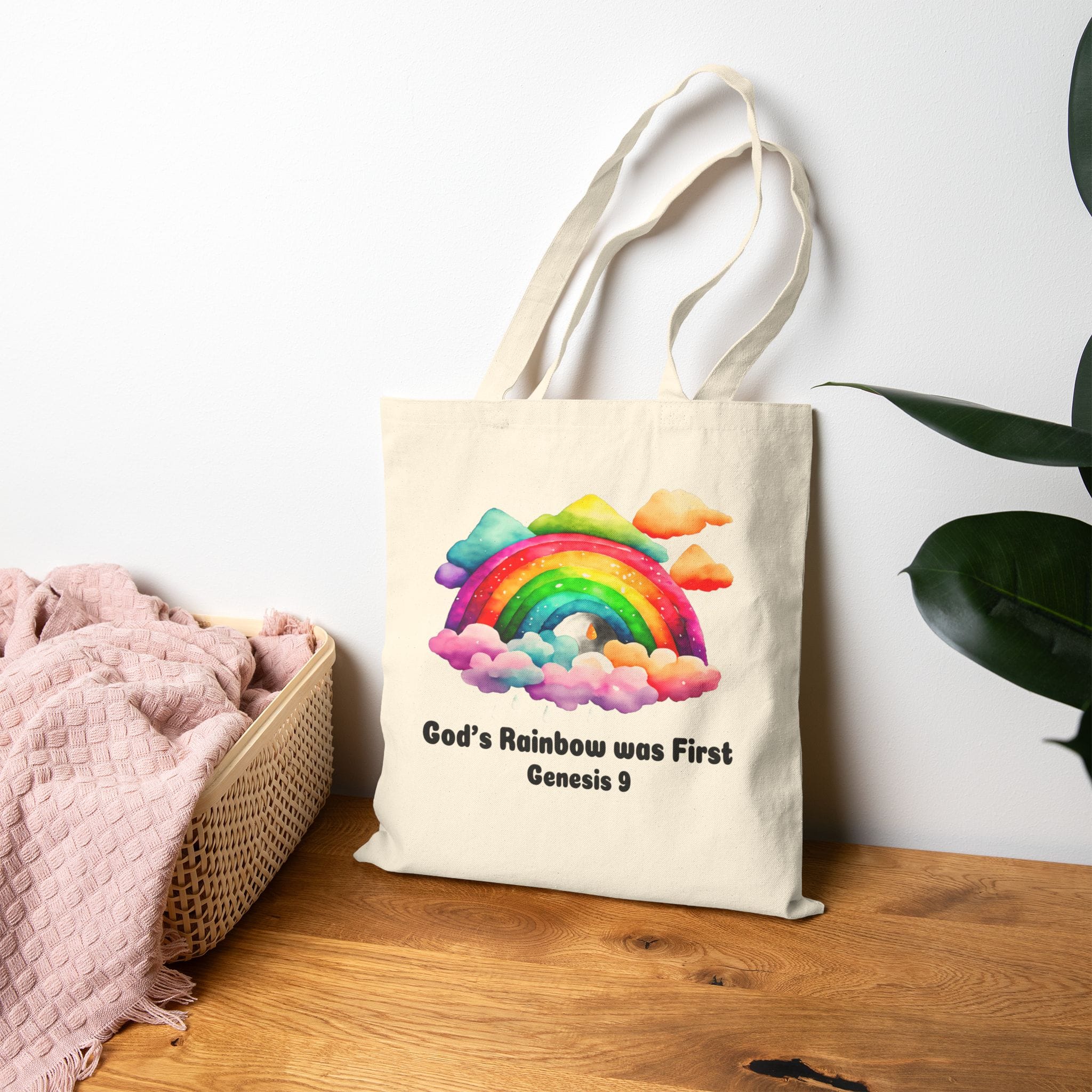 God's Rainbow was First Canvas Tote Bag in Natural standing up on table