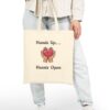 Hands Up... Hearts Open Canvas Tote in Natural held by model