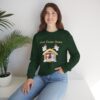 Love Came Down Nativity Sweatshirt in Forest Green on seated model