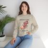Kindness is a Seed - Be a Seed Spreader Sweatshirt in Sand on seated female model