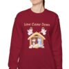 Love Came Down Nativity Sweatshirt in Cardinal Red on female model