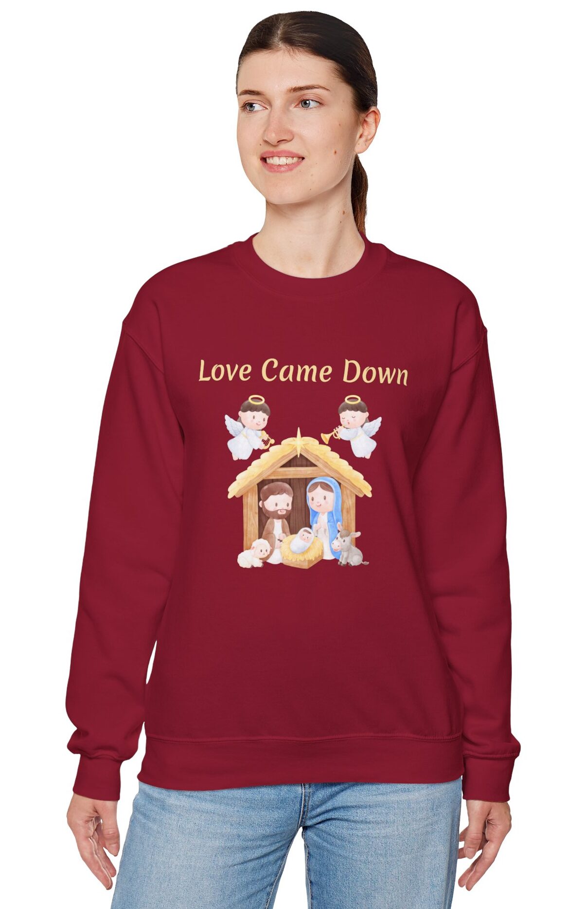 Love Came Down Nativity Sweatshirt in Cardinal Red on female model