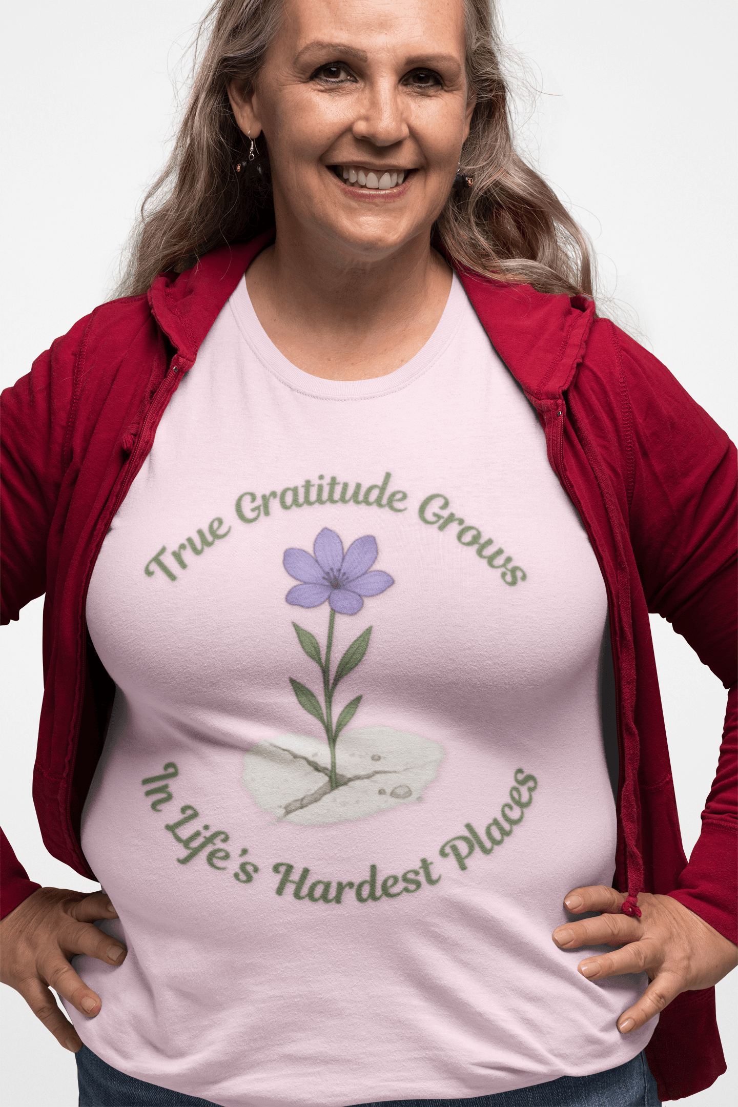 True Gratitude Grows...Hard Places Short Sleeve T-shirt in Light Pink on plus size model wearing red sweater.