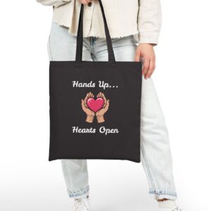 Hands Up... Hearts Open Canvas Tote in Black held by model
