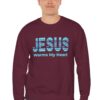 Jesus Warms My Heart Sweatshirt in Maroon on male model
