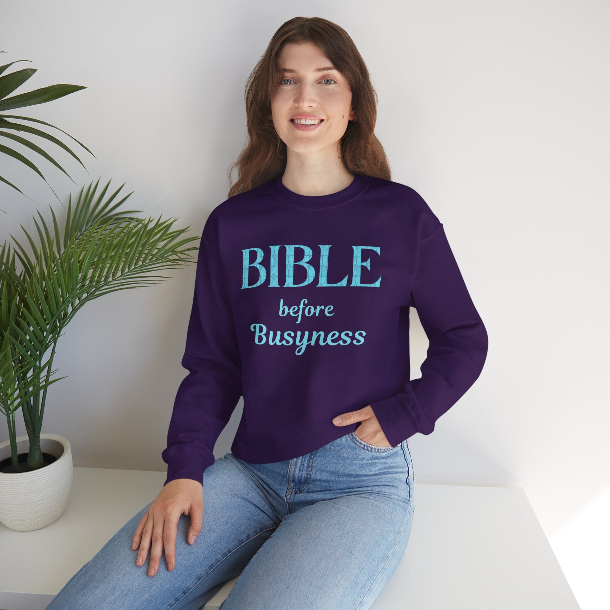 Bible before Busyness Sweatshirt in Purple on seated female model