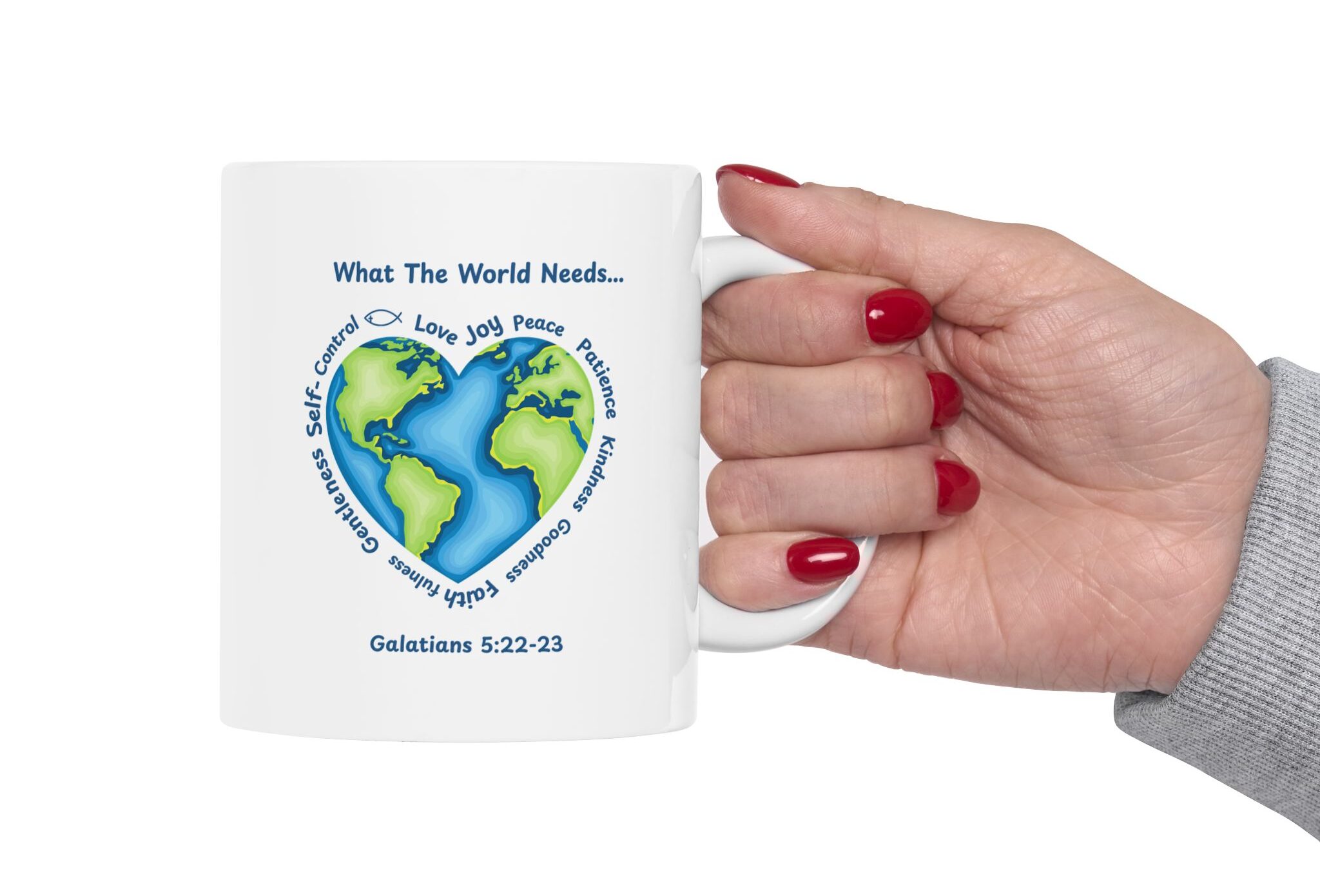 "What the World Needs..." Ceramic Mug held in female model hand