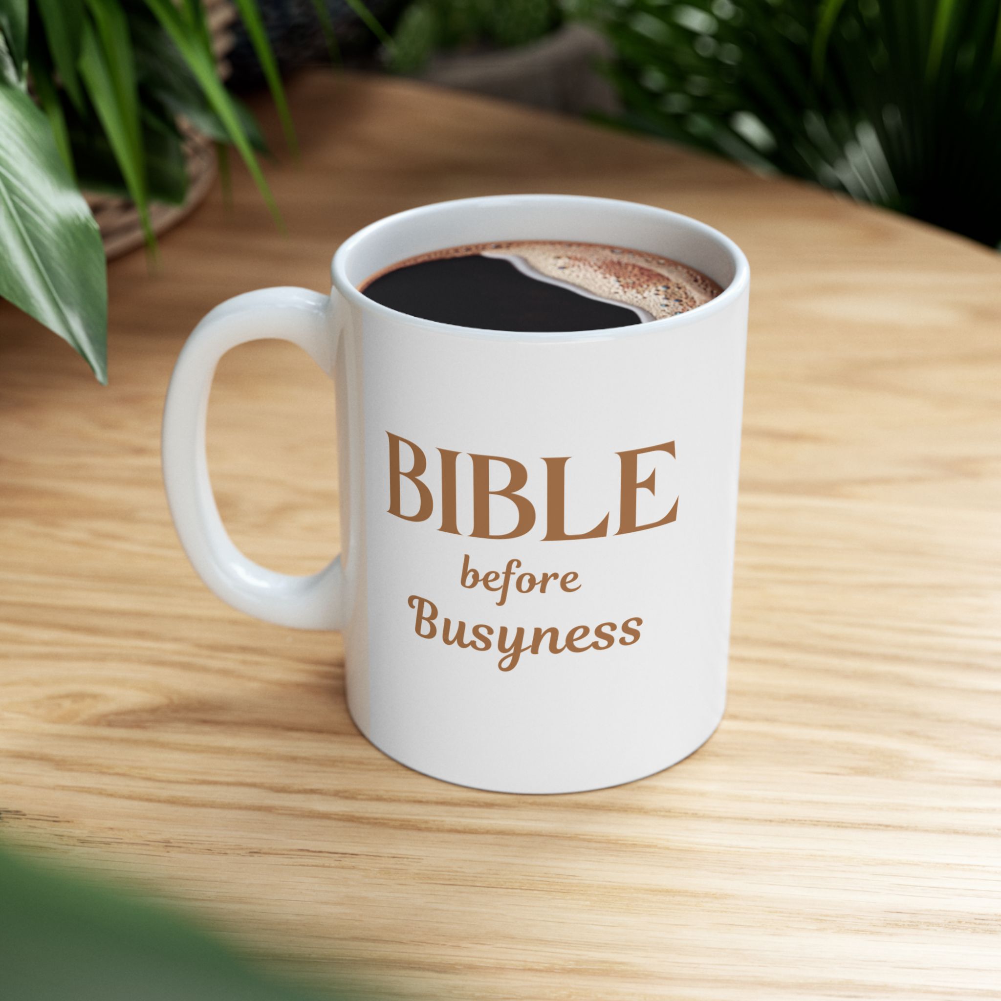 "Bible Before Busyness" Ceramic Mug on wood grain table