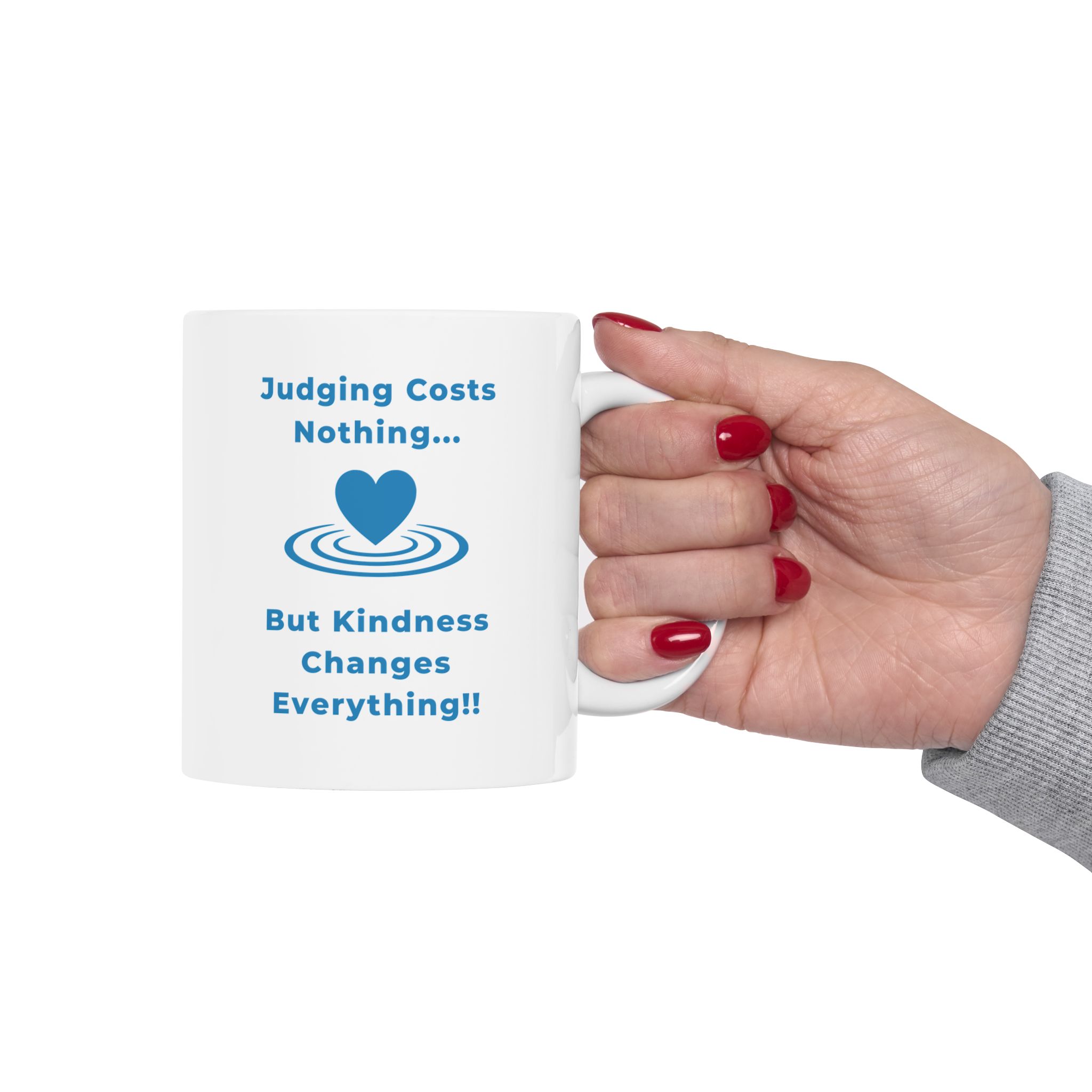 "Judging Costs Nothing..." Ceramic Mug in woman's hand