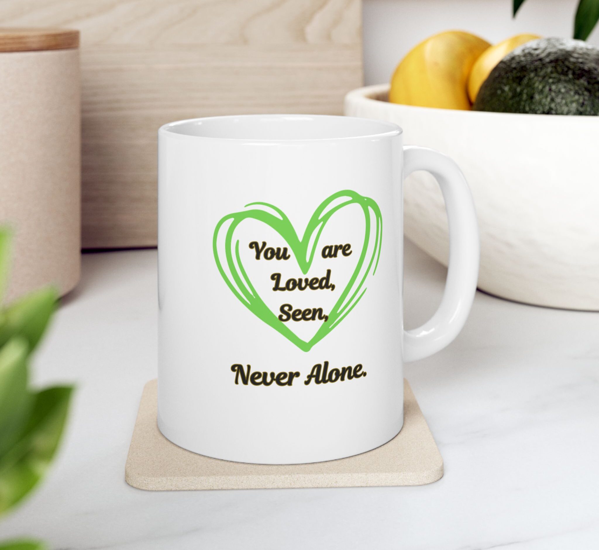 "You are Loved Seen & Never Alone" Ceramic Mug on kitchen counter
