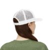 "Character Over Charm" Embroidered Trucker Cap in white back view on female model