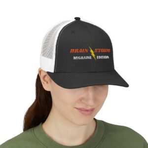 "Brain Storm Migraine Edition" Embroidered Trucker Cap in Black/White on female model