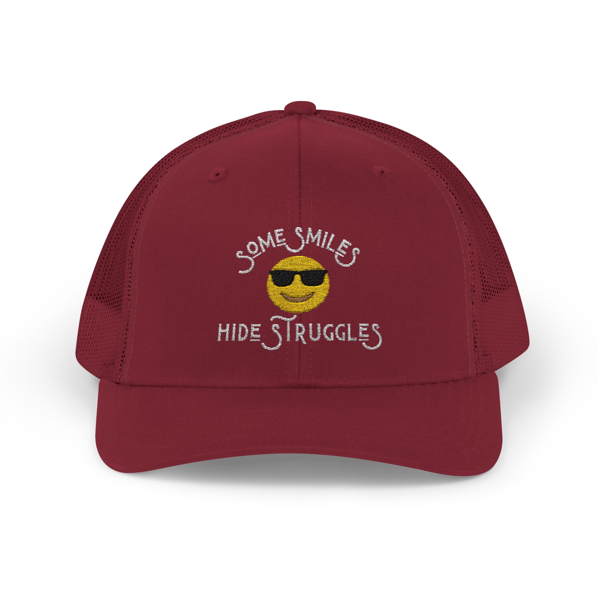 "Some Smiles Hide Struggles" Embroidered Trucker Cap in Cranberry (Both) front view